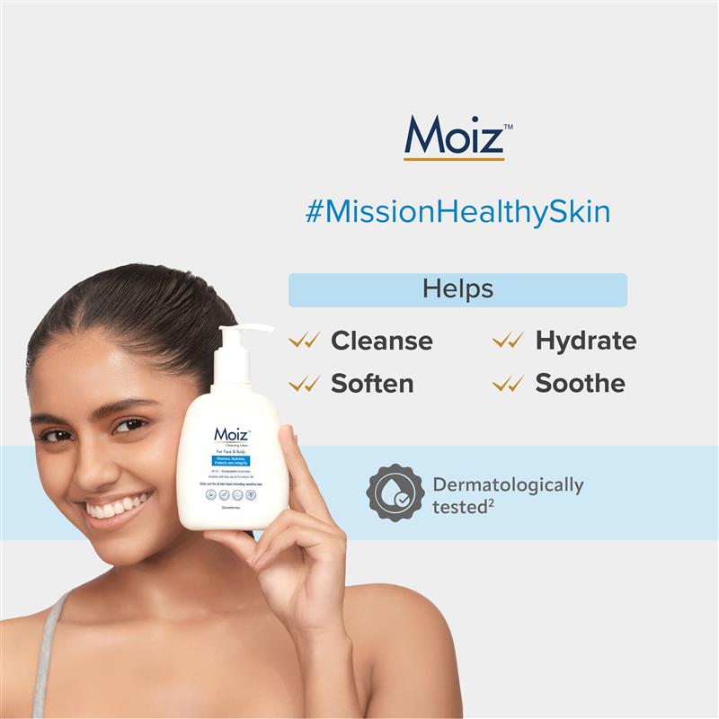 Woman holding a Moiz skincare product on a light blue background