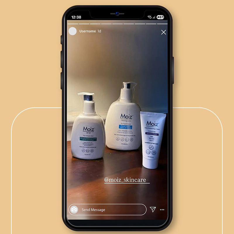 Phone screen displaying Moiz skincare products on a beige background